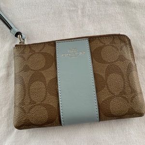 Coach leather wristlet Easy wipe down 2 cc.